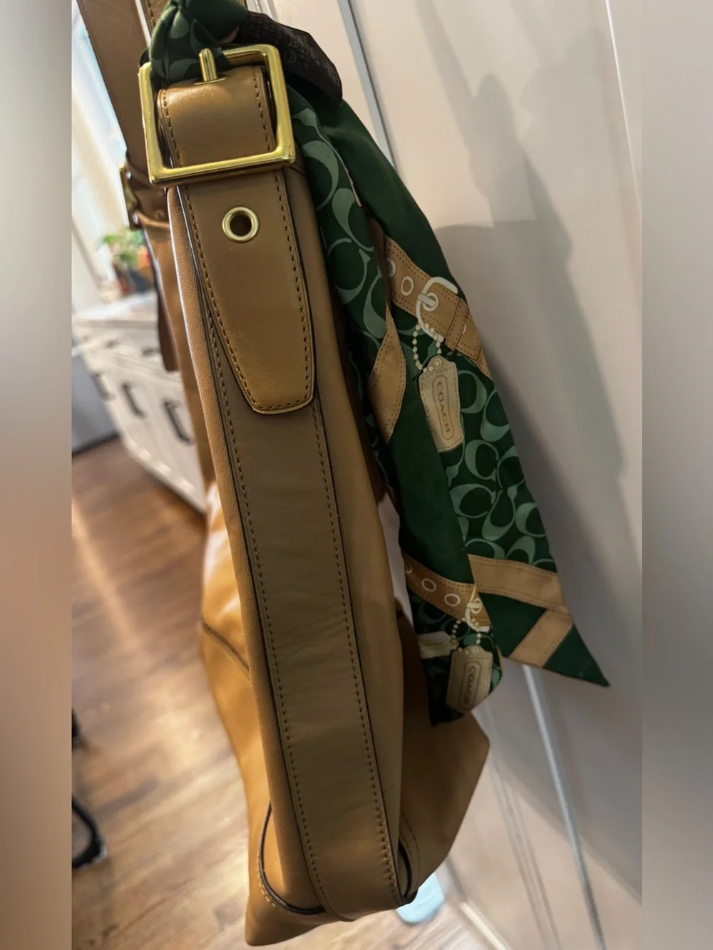 Coach many tan tassel